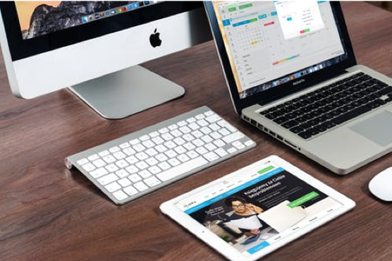 Responsive Web Design. Picture shows a desktop, laptop and tablet.